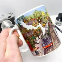 Springtime on the Watercress Line Coffee Mug by artist and illustrator Jonathan Chapman