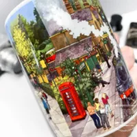 Springtime on the Watercress Line Coffee Mug by artist and illustrator Jonathan Chapman